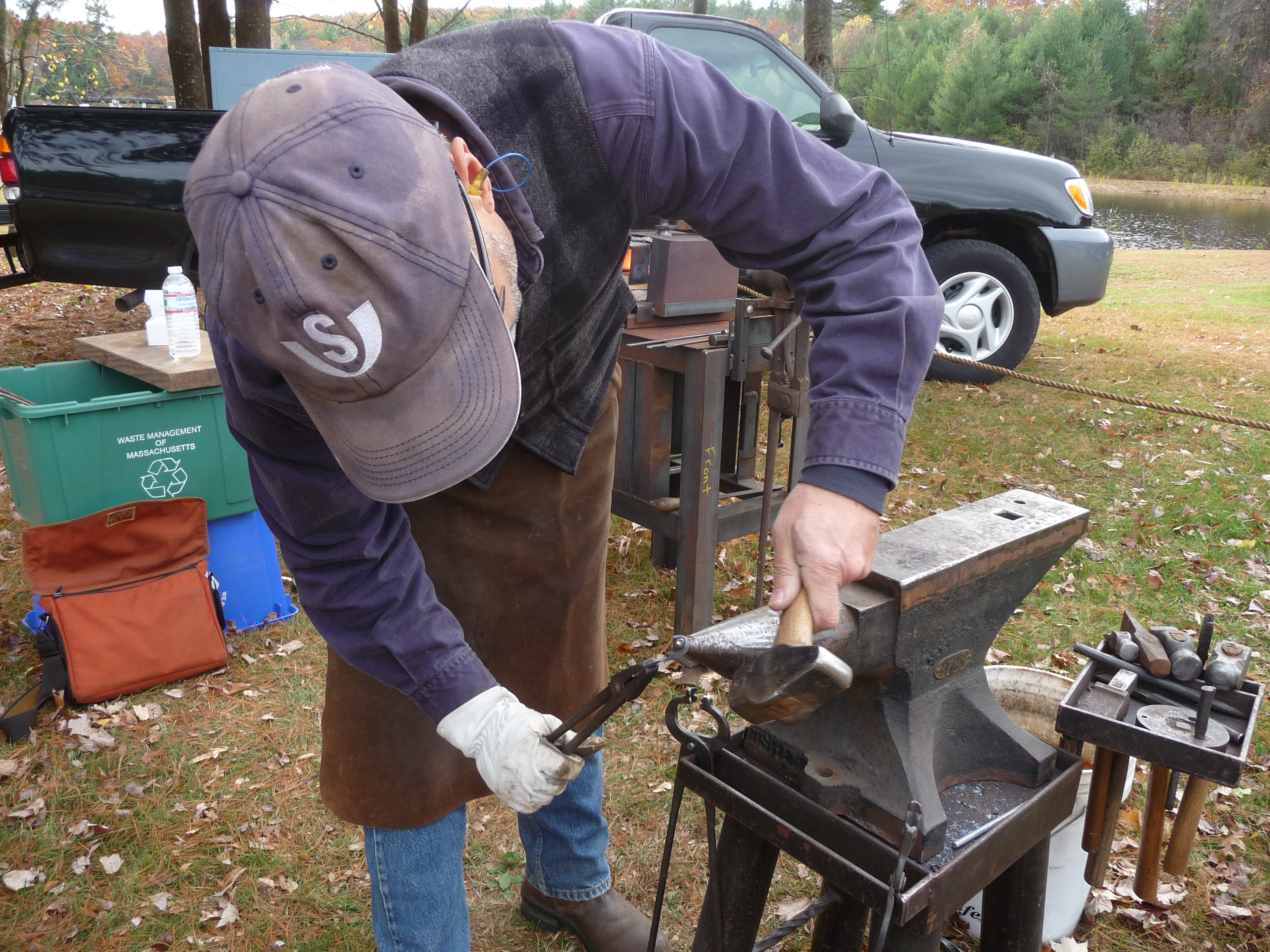 Ray Ciemny, an artisan and blacksmith, demos his craft